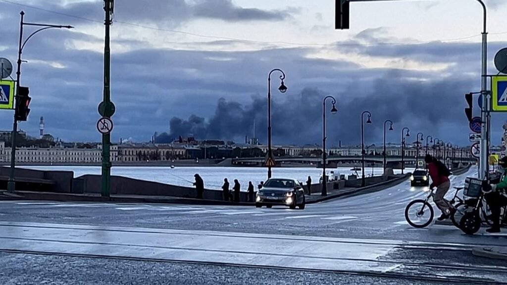 Massive Drone Attacks Hit Energy Facilities in St Petersburg fire following drone attacks